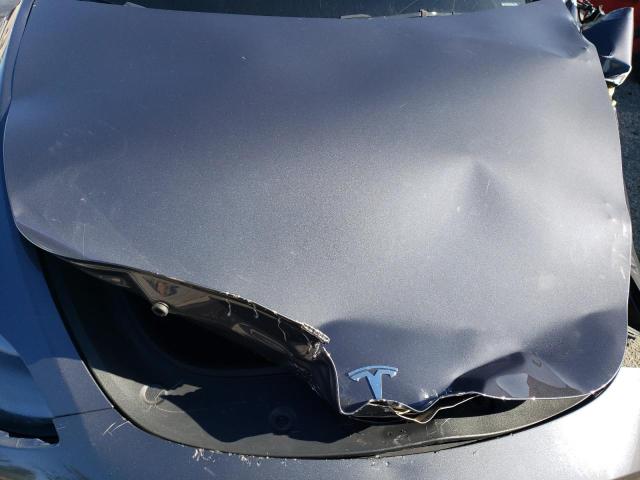 Photo 11 from auction – 2023 TESLA MODEL Y with VIN 7SAYGAEE7PF865250
