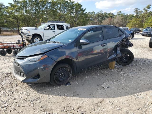 TOYOTA COROLLA L 2017 with VIN 5YFBURHE3HP701554 - Photo from auction