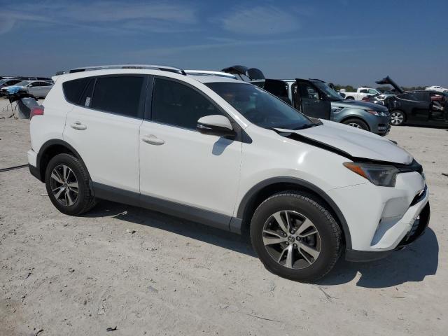 Photo 4 from auction – 2016 TOYOTA RAV4 XLE with VIN JTMWFREV3GJ088242