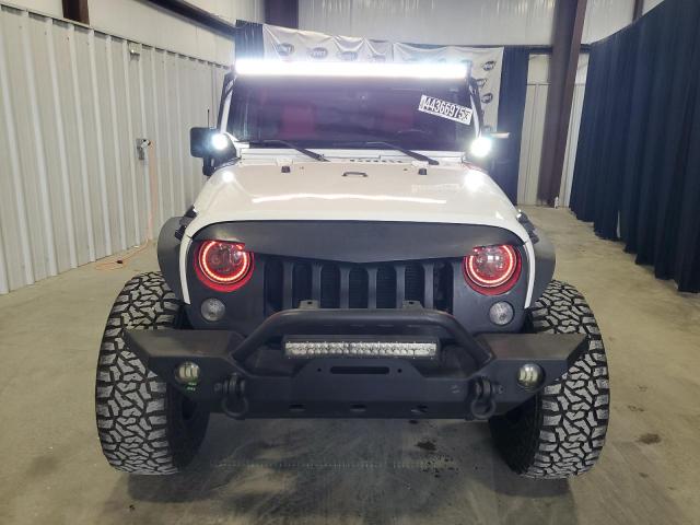 Photo 5 from auction – 2015 JEEP WRANGLER U with VIN 1C4BJWDG0FL749601