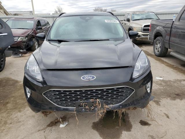 Photo 5 from auction – 2021 FORD ESCAPE SEL with VIN 1FMCU9H65MUA50322