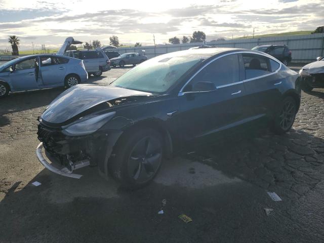 TESLA MODEL 3 2018 with VIN 5YJ3E1EBXJF077167 - Photo from auction