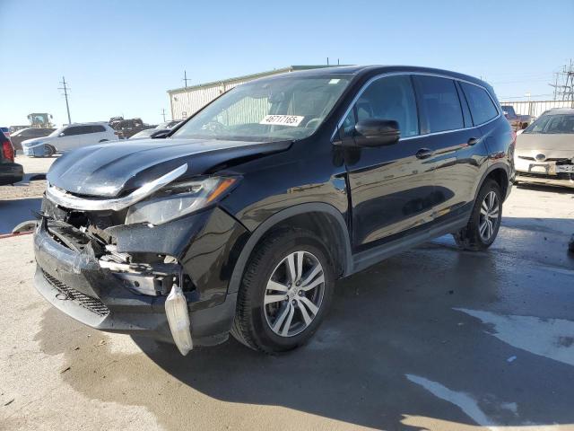 HONDA PILOT EXL 2018 with VIN 5FNYF6H51JB051272 - Photo from auction