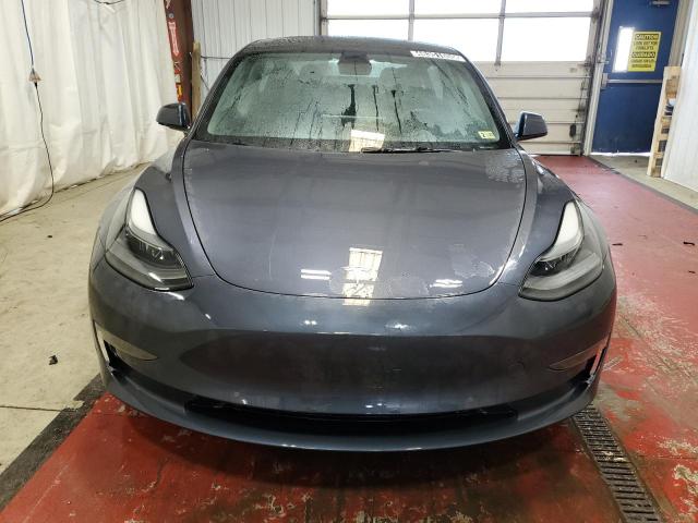 Photo 5 from auction – 2022 TESLA MODEL 3 with VIN 5YJ3E1EAXNF369690