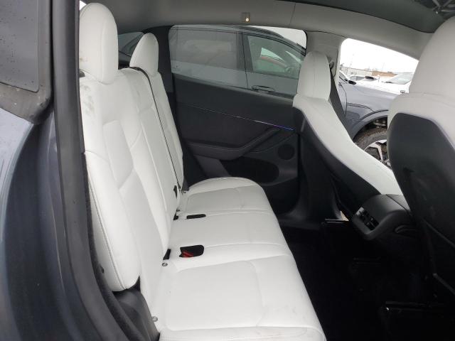 Photo 11 from auction – 2023 TESLA MODEL Y with VIN 7SAYGDEF1PF833307
