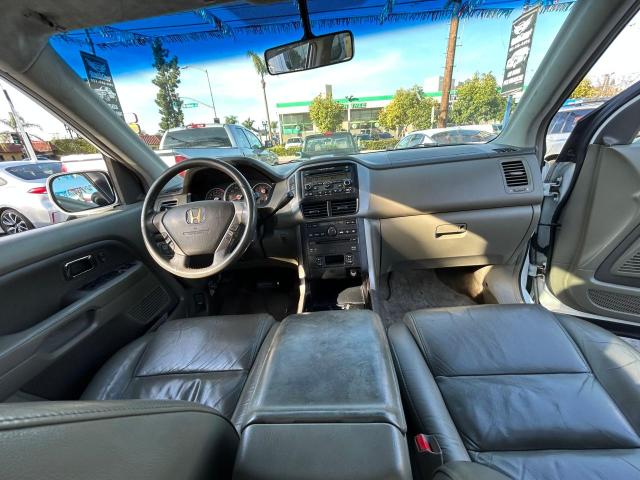 Photo 9 from auction – 2006 HONDA PILOT EX with VIN 2HKYF186X6H534487