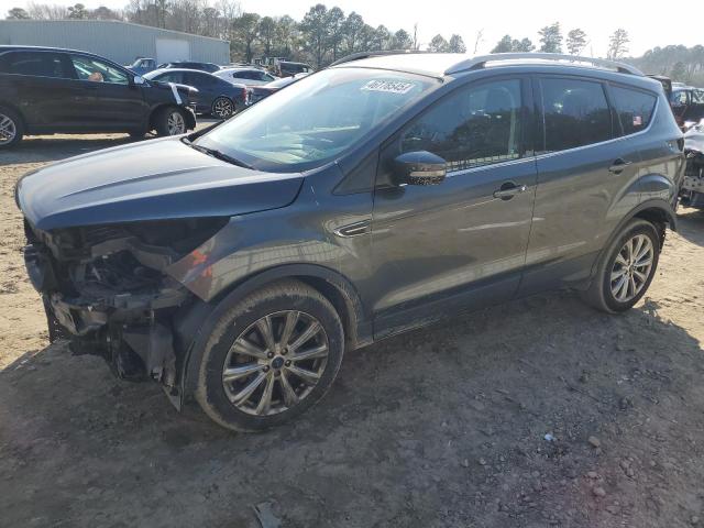FORD ESCAPE TIT 2017 with VIN 1FMCU9J96HUF00229 - Photo from auction