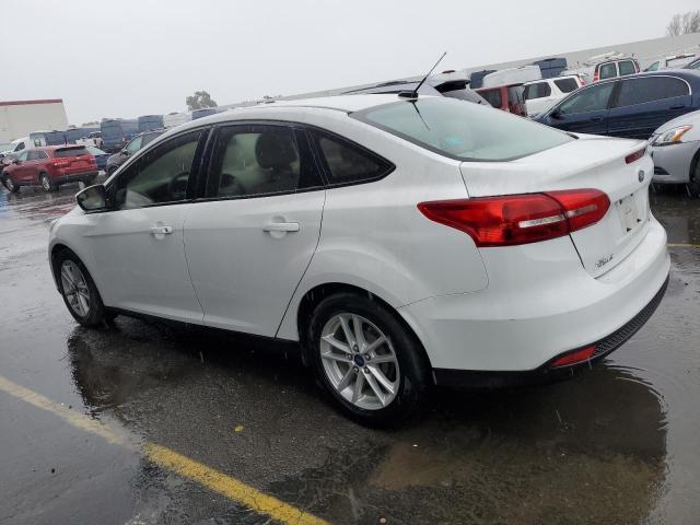 Снимка 2 от търг – 2015 FORD FOCUS SE с VIN 1FADP3F29FL327470