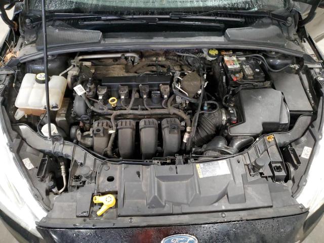 Photo 11 from auction – 2015 FORD FOCUS SE with VIN 1FADP3F28FL310689