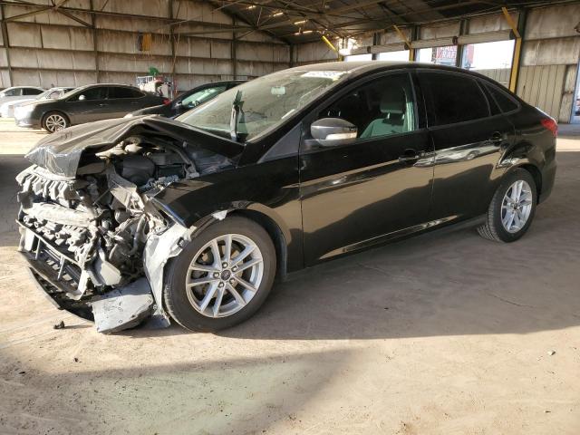 FORD FOCUS SE 2017 with VIN 1FADP3F21HL304591 - Photo from auction
