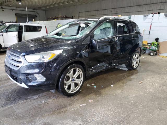 FORD ESCAPE TIT 2017 with VIN 1FMCU9J98HUC05746 - Photo from auction