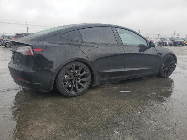 Photo 3 from auction – 2022 TESLA MODEL 3 with VIN 5YJ3E1EB9NF355000