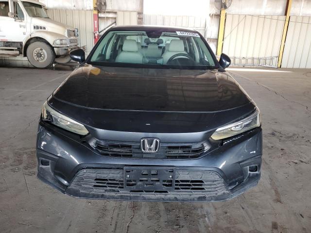 Photo 5 from auction – 2024 HONDA CIVIC LX with VIN 2HGFE2F29RH541476
