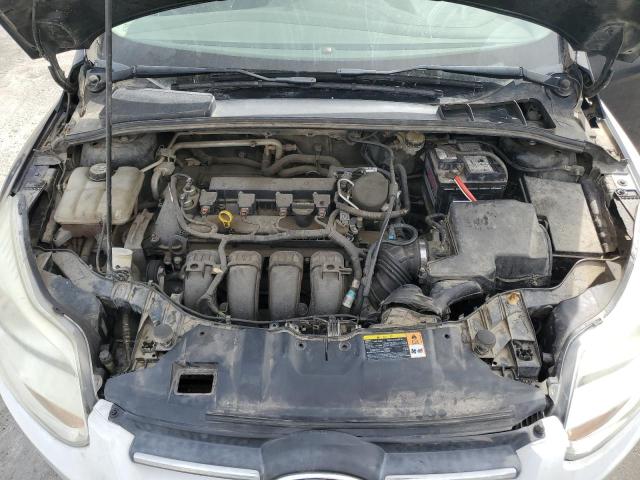 Photo 11 from auction – 2013 FORD FOCUS SE with VIN 1FADP3K26DL277551