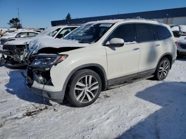 HONDA PILOT TOUR 2016 with VIN 5FNYF6H93GB031939 - Photo from auction