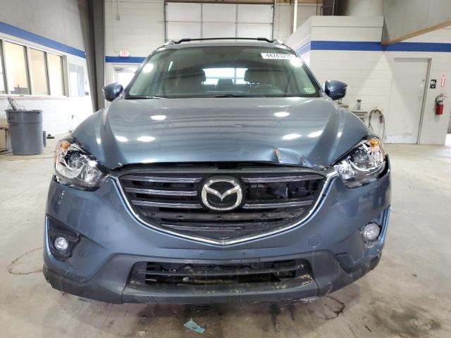 Photo 5 from auction – 2016 MAZDA CX-5 TOURI with VIN JM3KE4CY7G0840989