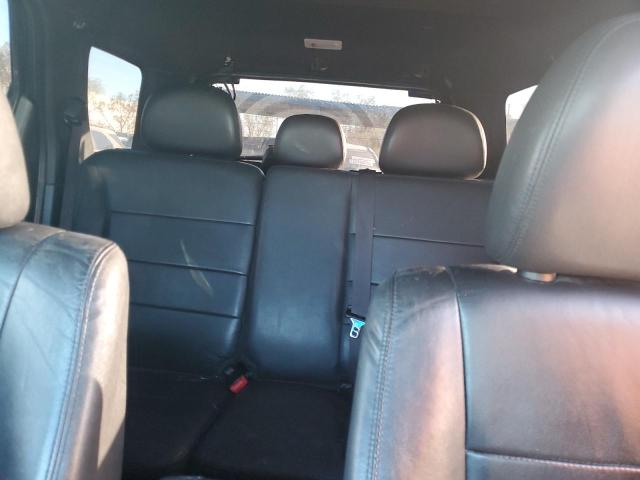 Photo 10 from auction – 2011 FORD ESCAPE LIM with VIN 1FMCU9EG1BKA74428