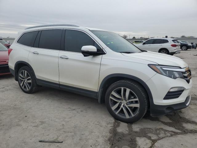 Photo 4 from auction – 2017 HONDA PILOT TOUR with VIN 5FNYF5H97HB047668