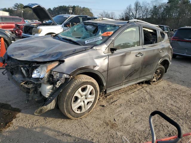 TOYOTA RAV4 LE 2014 with VIN JTMZFREV3EJ006228 - Photo from auction