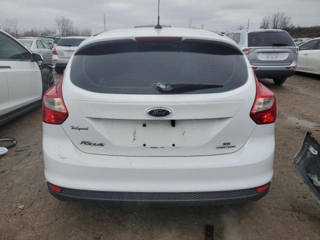 Foto 6 de la subasta – 2014 FORD FOCUS SE con VIN 1FADP3K26EL286767