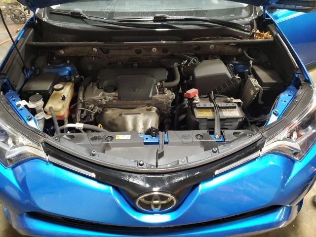 Photo 11 from auction – 2018 TOYOTA RAV4 LE with VIN JTMBFREV0JJ249720