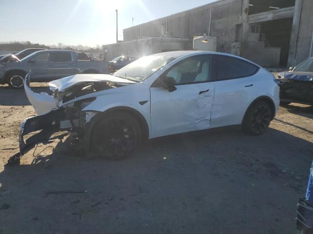 TESLA MODEL Y 2023 with VIN 7SAYGAEE9PF795914 - Photo from auction