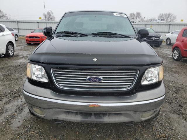 Photo 5 from auction – 2002 FORD F150 with VIN 2FTRX08L32CA83548
