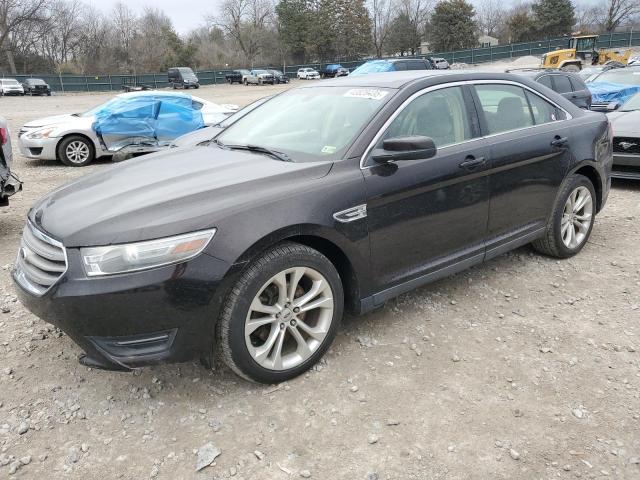 FORD TAURUS SEL 2013 with VIN 1FAHP2E86DG209397 - Photo from auction