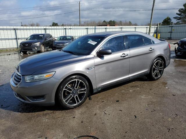 FORD TAURUS SEL 2014 with VIN 1FAHP2E85EG130580 - Photo from auction