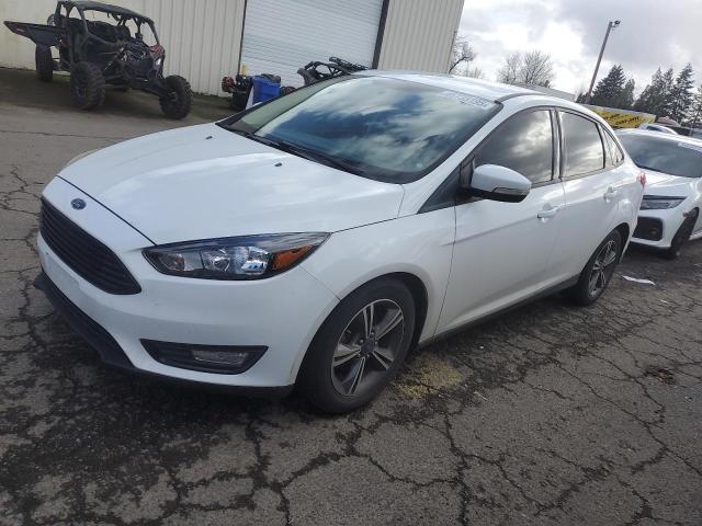 FORD FOCUS SE 2017 with VIN 1FADP3FE8HL308504 - Photo from auction