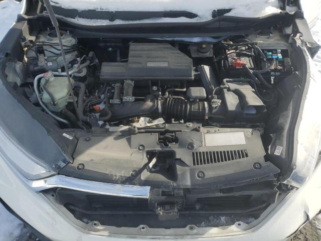 Photo 12 from auction – 2018 HONDA CR-V with VIN 2HKRW2H94JH632539