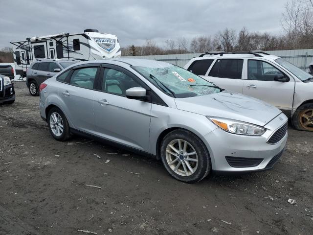 Снимка 4 от търг – 2018 FORD FOCUS SE с VIN 1FADP3F20JL283738