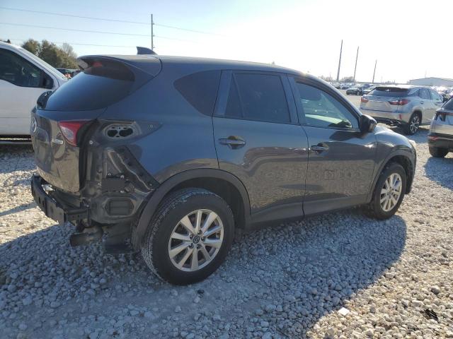 Photo 3 from auction – 2014 MAZDA CX-5 TOURI with VIN JM3KE2CYXE0364805