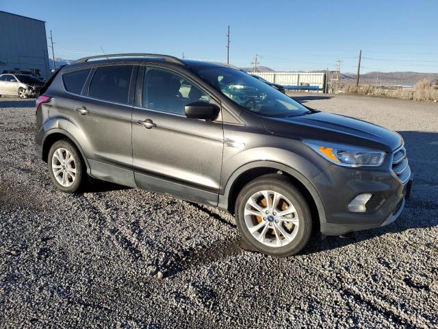 Photo 4 from auction – 2018 FORD ESCAPE SE with VIN 1FMCU9GD8JUC61154