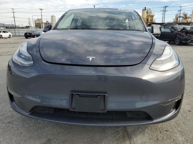 Photo 5 from auction – 2023 TESLA MODEL Y with VIN 7SAYGDEE1PA052923