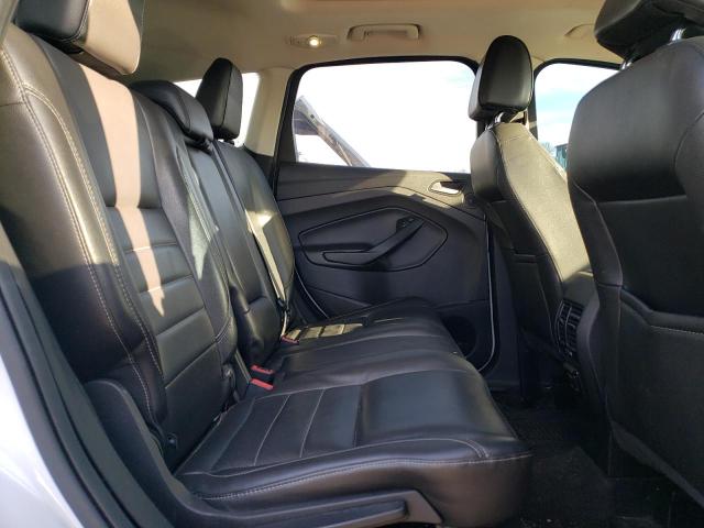Photo 11 from auction – 2016 FORD ESCAPE TIT with VIN 1FMCU9J95GUA25090