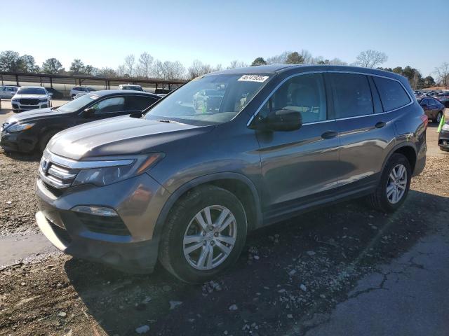HONDA PILOT LX 2016 with VIN 5FNYF5H15GB026763 - Photo from auction