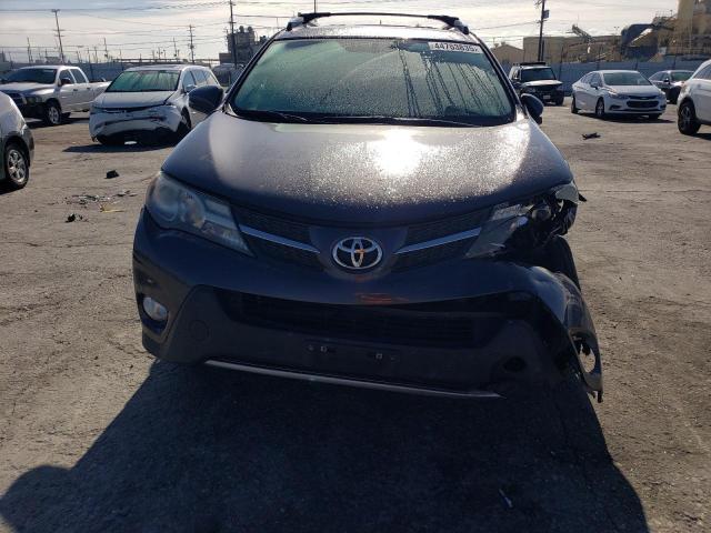 Photo 5 from auction – 2014 TOYOTA RAV4 XLE with VIN JTMWFREV4EJ008878