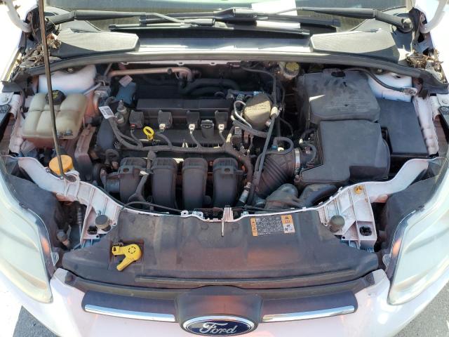 Photo 11 from auction – 2014 FORD FOCUS S with VIN 1FADP3E23EL429041