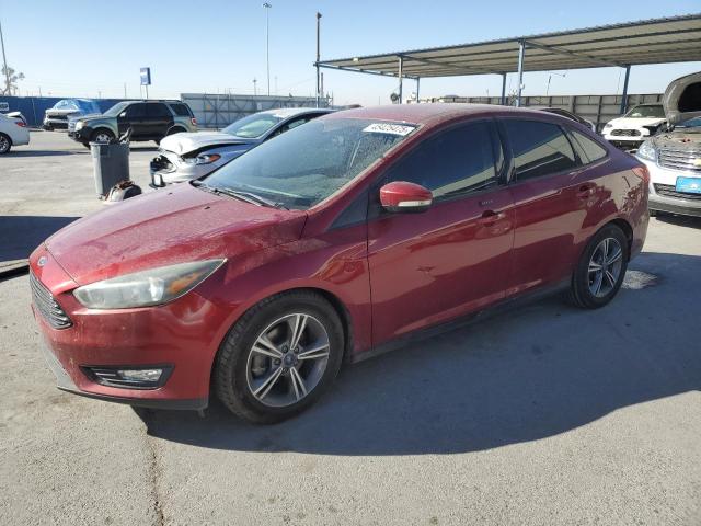 FORD FOCUS SE 2016 with VIN 1FADP3FE2GL318976 - Photo from auction