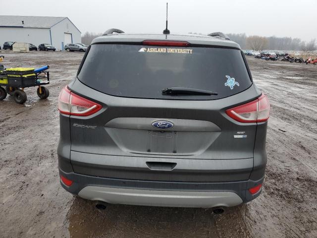 Photo 6 from auction – 2016 FORD ESCAPE SE with VIN 1FMCU9GX7GUB55233