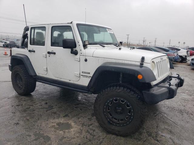 Photo 4 from auction – 2014 JEEP WRANGLER U with VIN 1C4BJWDG0EL210281