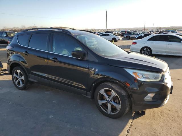 Photo 4 from auction – 2017 FORD ESCAPE SE with VIN 1FMCU0G99HUA81103