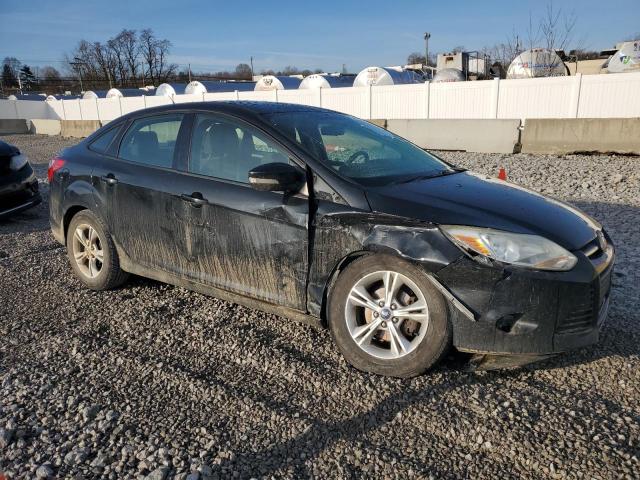 Foto 4 de la subasta – 2014 FORD FOCUS SE con VIN 1FADP3F27EL280938