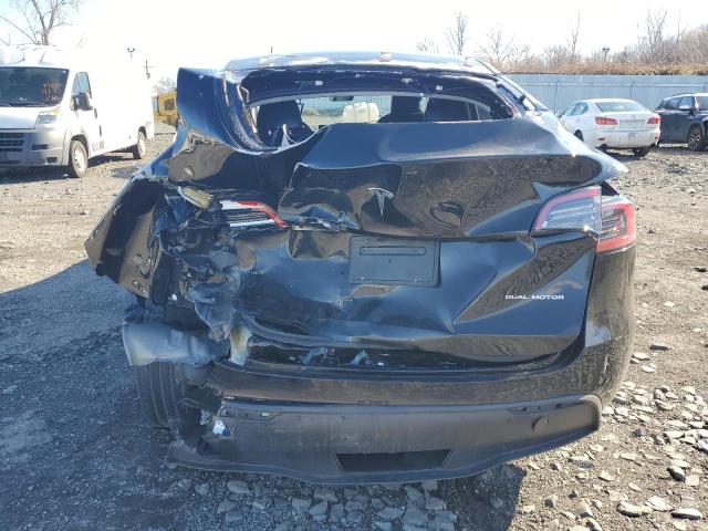 Photo 6 from auction – 2023 TESLA MODEL Y with VIN 7SAYGAEE3PF920048