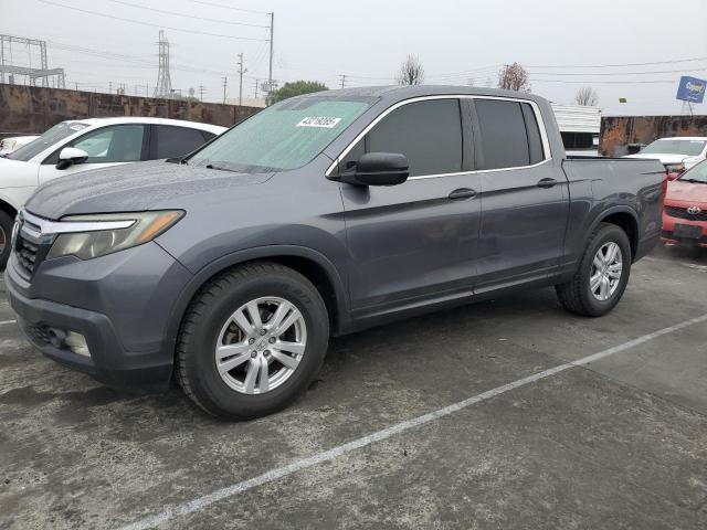 HONDA RIDGELINE 2017 with VIN 5FPYK2F23HB010124 - Photo from auction
