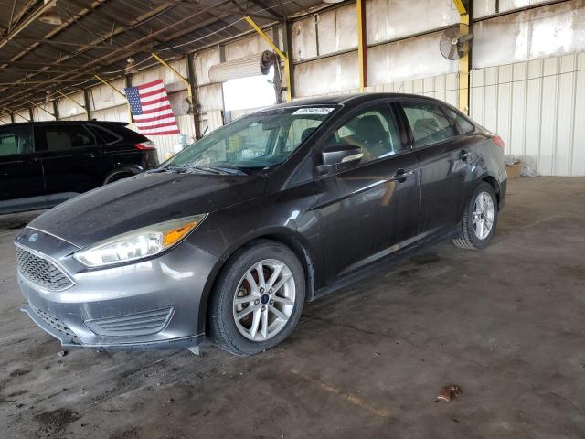 FORD FOCUS SE 2015 with VIN 1FADP3F24FL210542 - Photo from auction