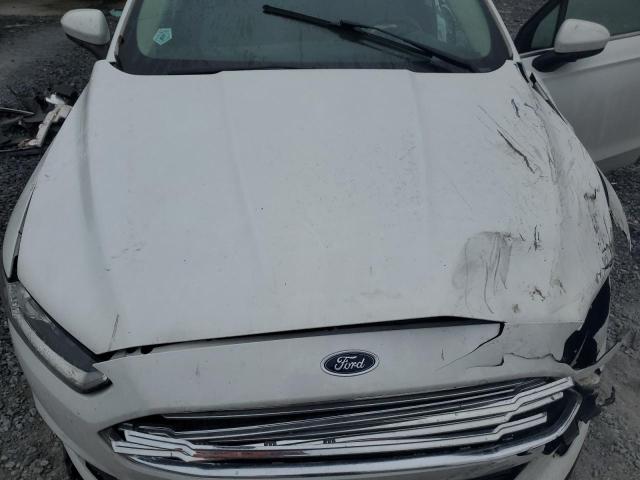 Photo 11 from auction – 2016 FORD FUSION S with VIN 3FA6P0G74GR190622