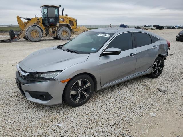 HONDA CIVIC TOUR 2016 with VIN 19XFC1F91GE007828 - Photo from auction