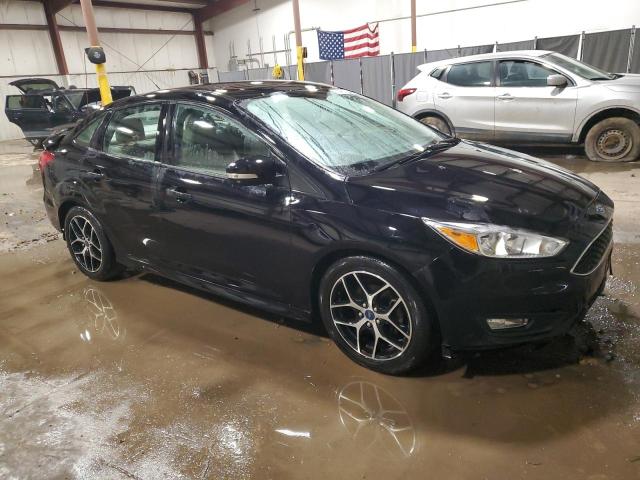 Photo 4 from auction – 2016 FORD FOCUS SE with VIN 1FADP3F22GL208094